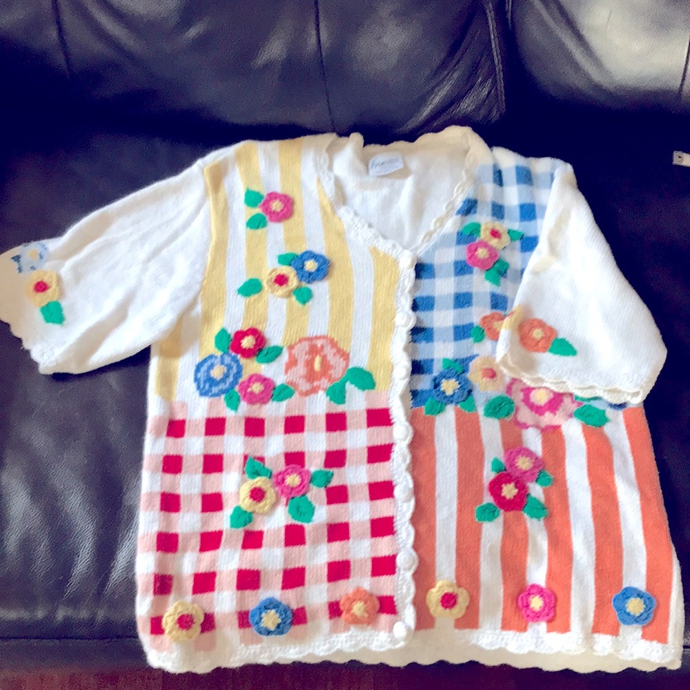 Adorable short sleeve cardigan.